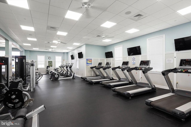 workout area with a paneled ceiling