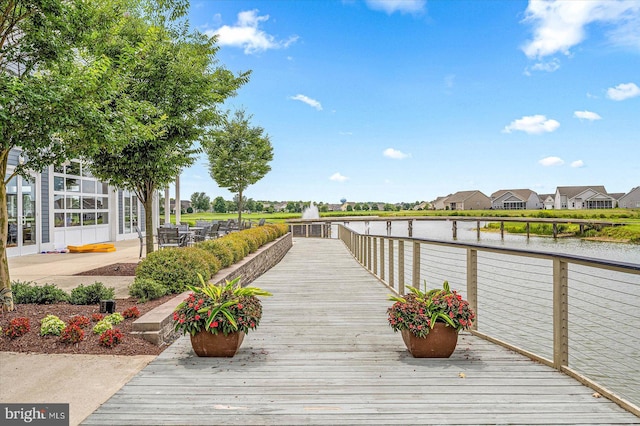 dock area featuring a water view