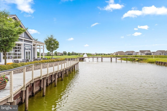 view of dock with a water view