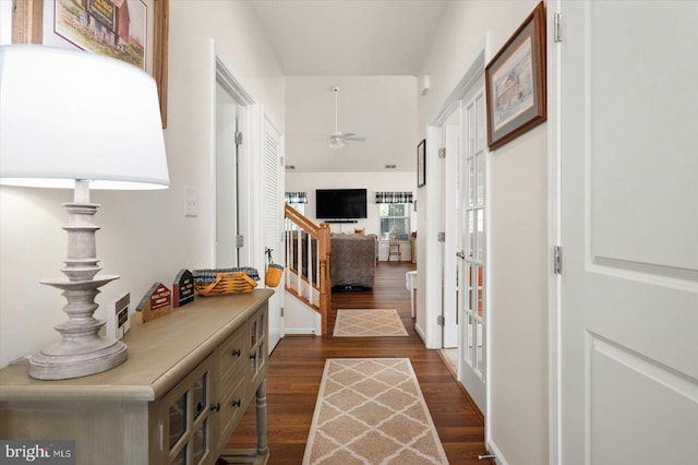 hall featuring dark hardwood / wood-style floors and french doors