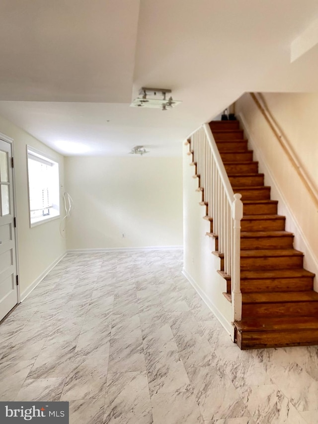 interior space with tile patterned floors