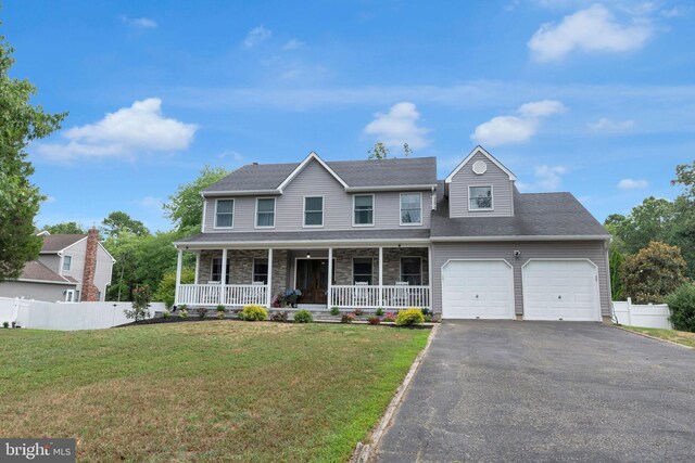 view of front of property with a porch and a front yard