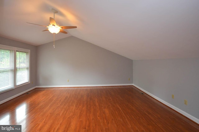 bonus room with lofted ceiling, ceiling fan, and wood-type flooring