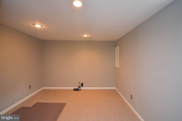 spare room featuring carpet flooring