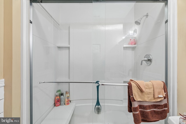 bathroom featuring walk in shower