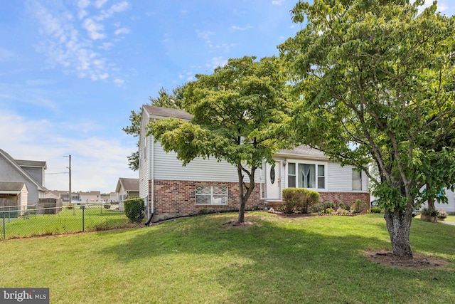 view of front of property with a front lawn