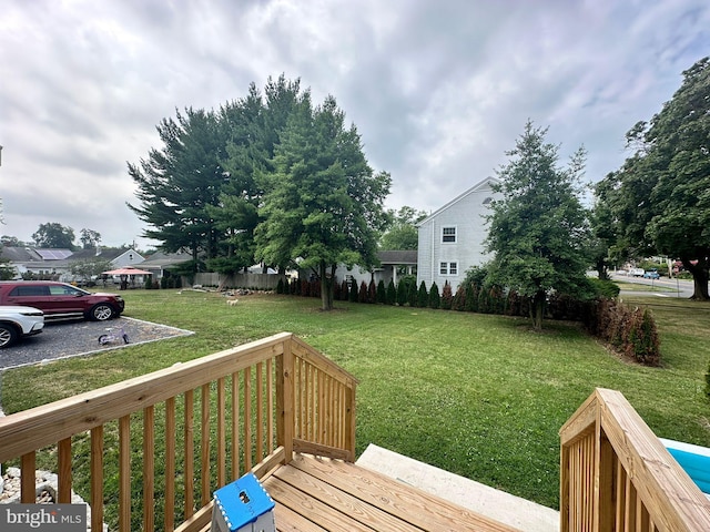 view of yard featuring a wooden deck