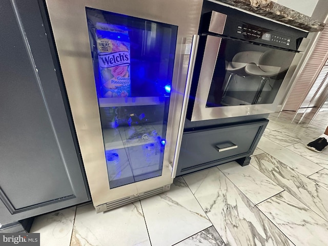 room details with wall oven and wine cooler