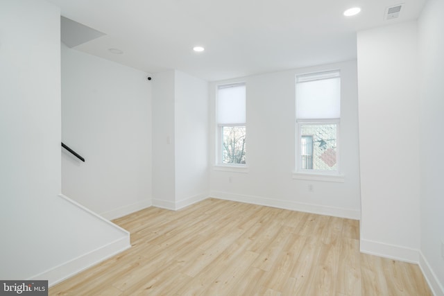 empty room with light wood-type flooring