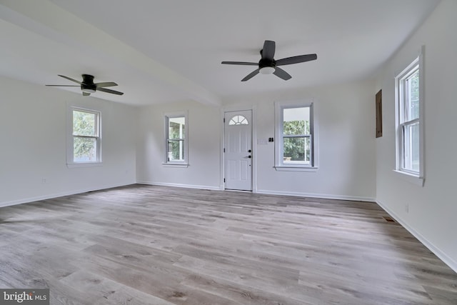 entrance foyer with ceiling fan and light wood-type flooring