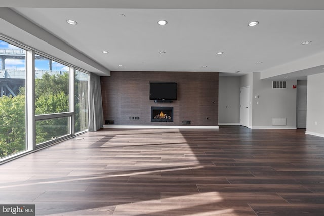 unfurnished living room featuring a fireplace