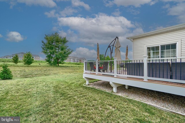 view of yard with a wooden deck