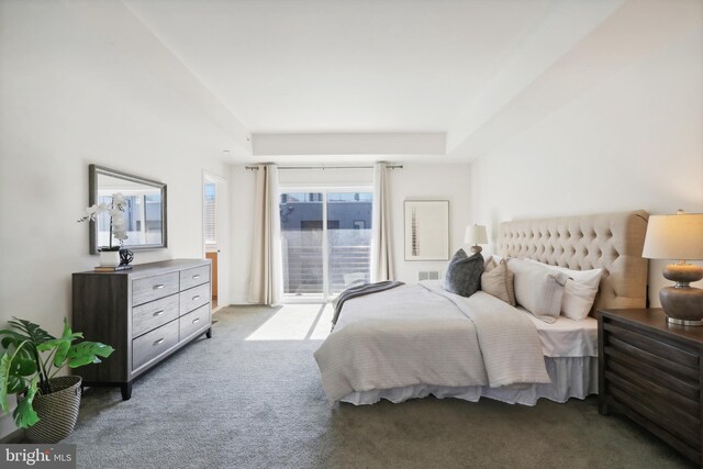 carpeted spare room with lofted ceiling