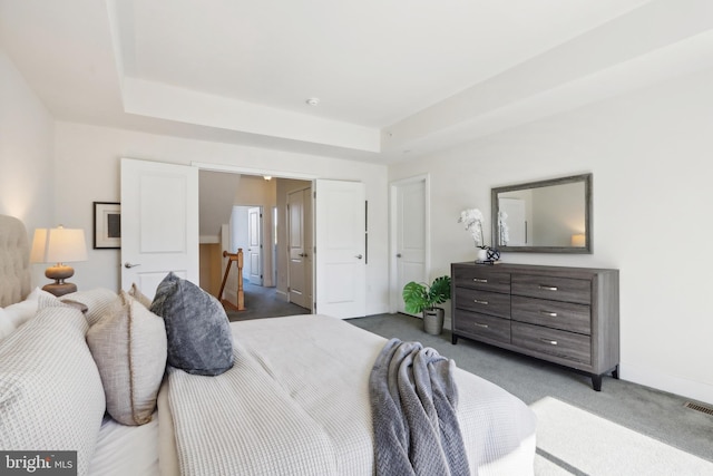 bedroom featuring dark colored carpet