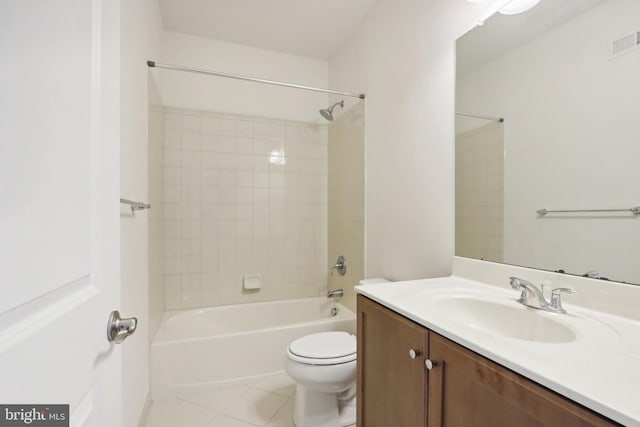 full bathroom with vanity, toilet, tile patterned floors, and tiled shower / bath