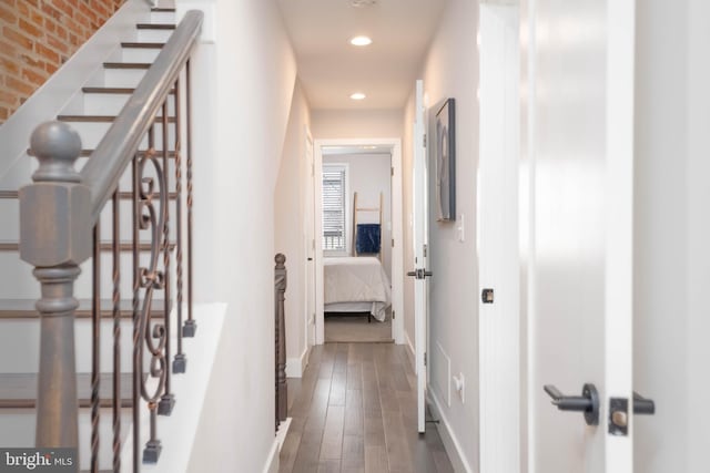 hallway with wood-type flooring