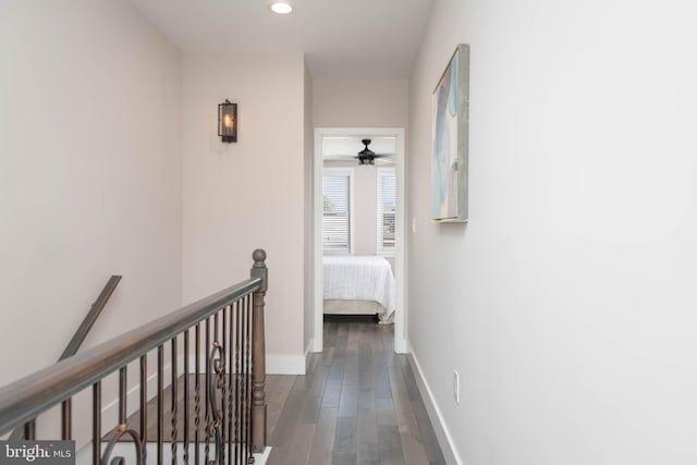 hallway featuring dark hardwood / wood-style flooring