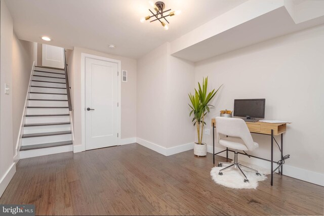 office space with dark hardwood / wood-style floors