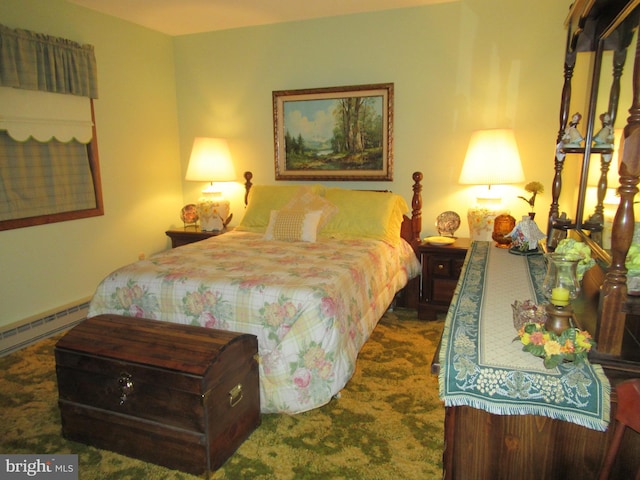 bedroom featuring dark carpet and baseboard heating