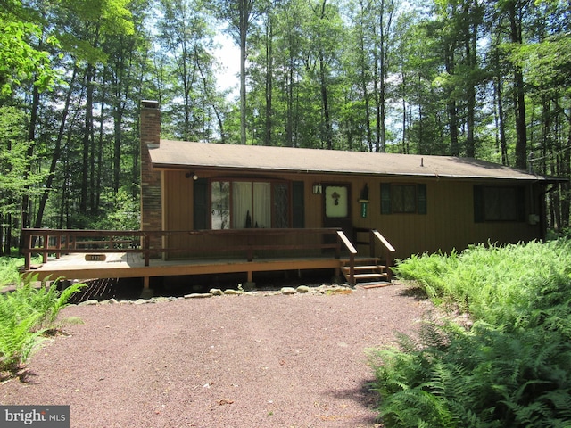 view of front of property featuring a deck