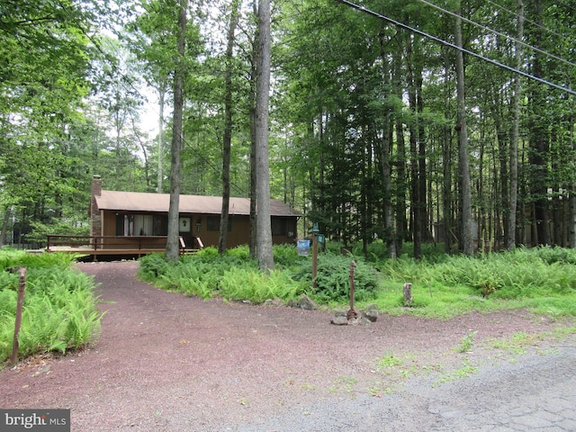 view of front of house with a wooden deck