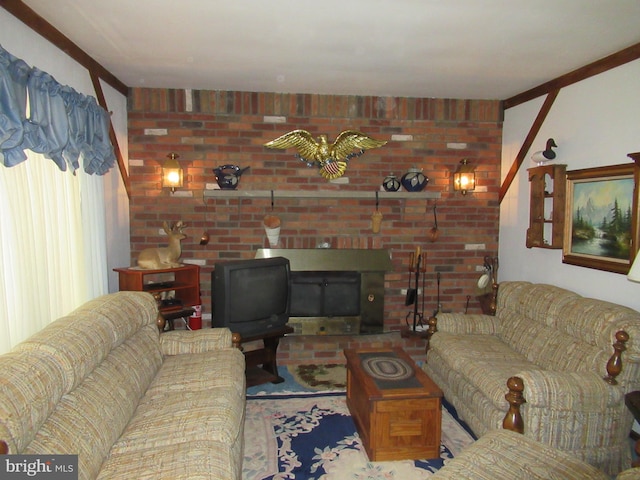 living room featuring a fireplace