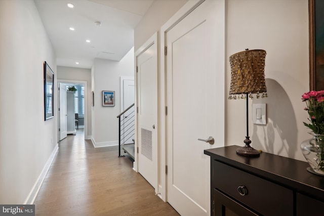 hall featuring wood-type flooring