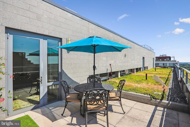 view of patio with a balcony