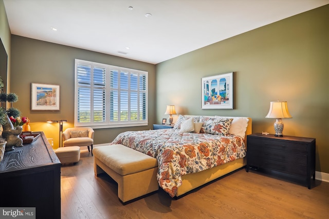 bedroom with wood-type flooring