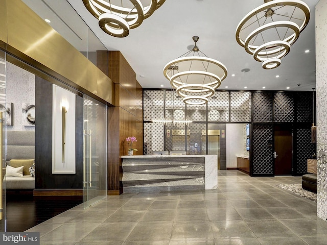 reception area featuring a chandelier