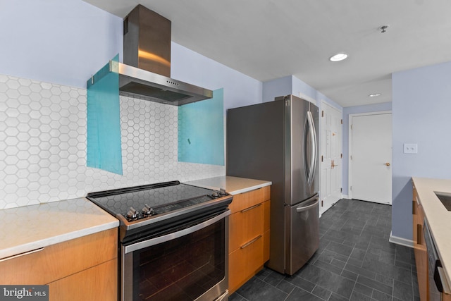 kitchen with stainless steel appliances, tasteful backsplash, and wall chimney range hood