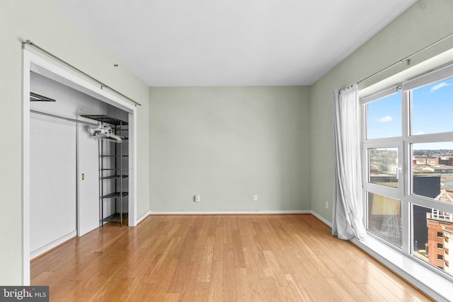 unfurnished bedroom with light hardwood / wood-style flooring