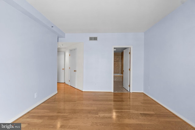 empty room featuring light wood-type flooring