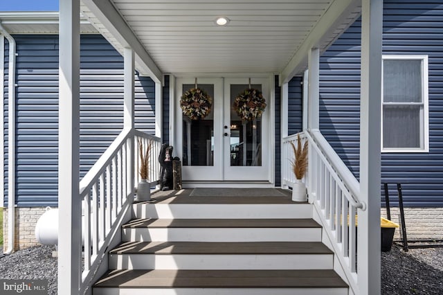 property entrance featuring a porch