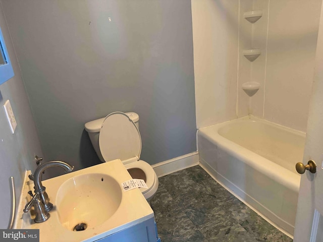 bathroom featuring toilet and sink