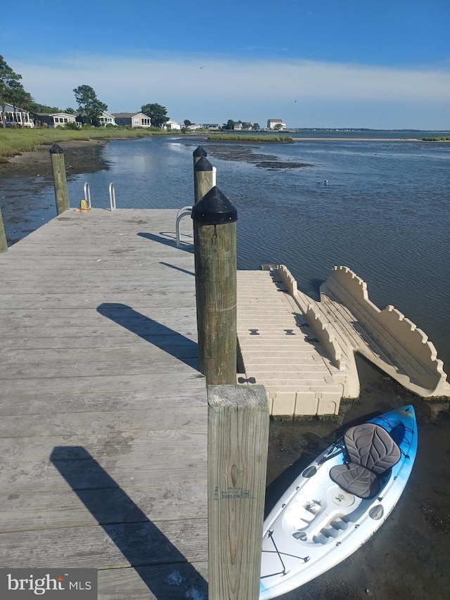 view of dock featuring a water view