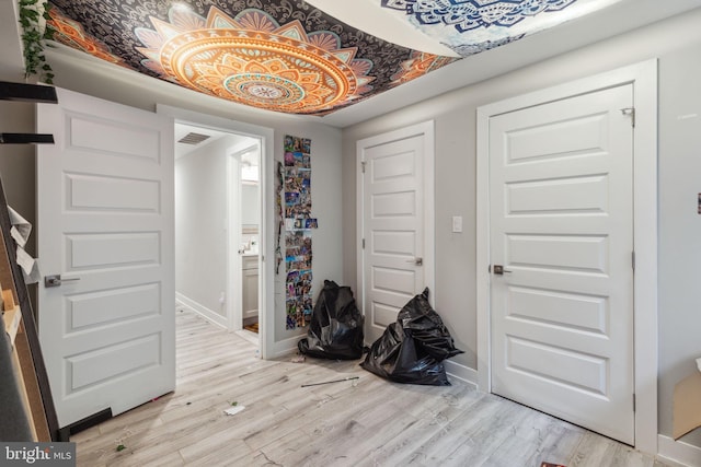 entrance foyer with light wood-type flooring