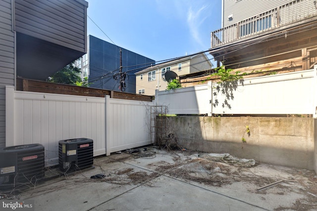 view of patio with central AC