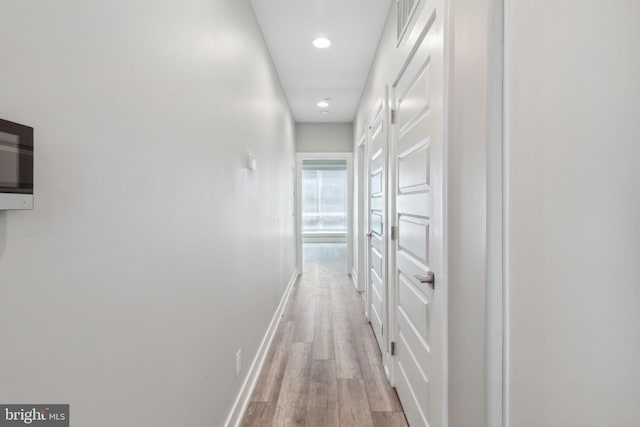 hall featuring hardwood / wood-style floors