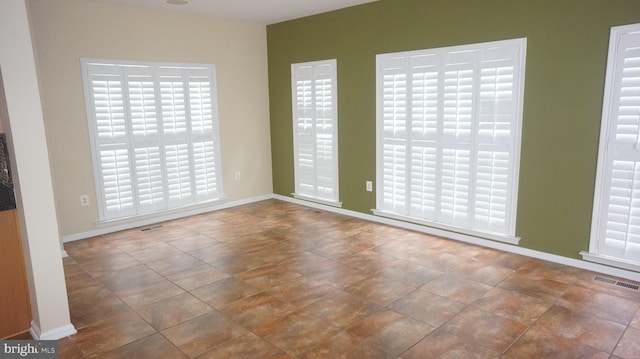 view of tiled spare room