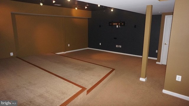 basement with carpet flooring