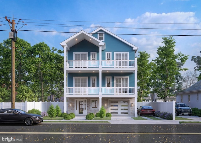 view of front of property with a balcony and a garage