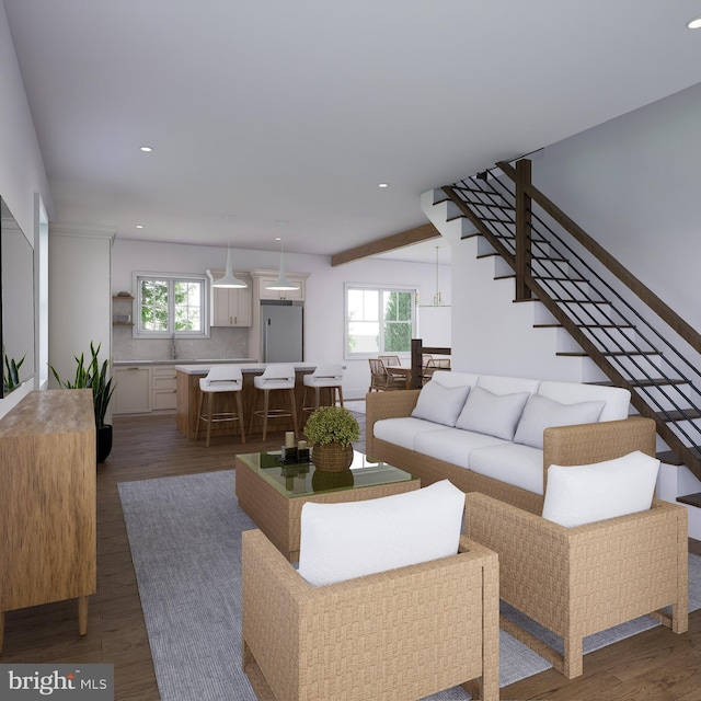 living room with dark hardwood / wood-style floors and sink