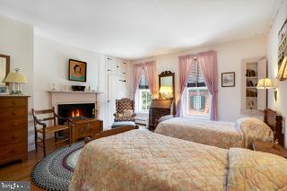 bedroom featuring hardwood / wood-style flooring