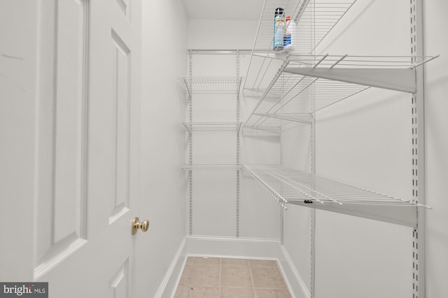 interior space featuring light tile patterned flooring