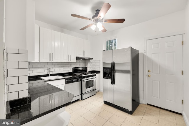 kitchen featuring white cabinetry, tasteful backsplash, ceiling fan, appliances with stainless steel finishes, and sink