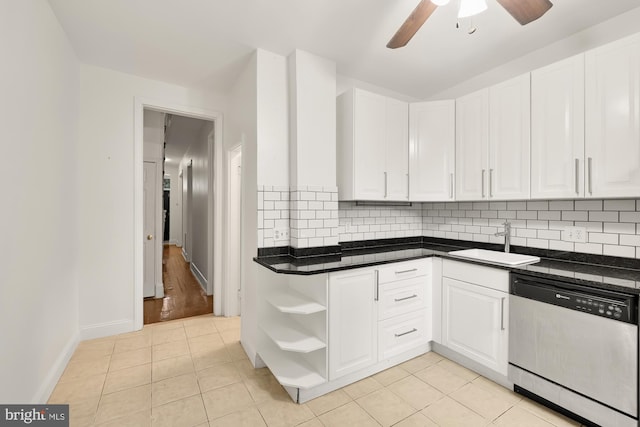 kitchen with ceiling fan, light wood-type flooring, sink, dishwasher, and backsplash