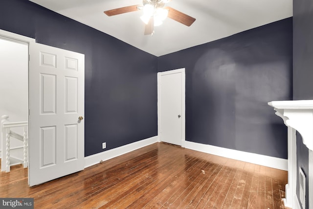 interior space featuring hardwood / wood-style flooring and ceiling fan