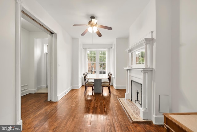 living area with ceiling fan and hardwood / wood-style flooring