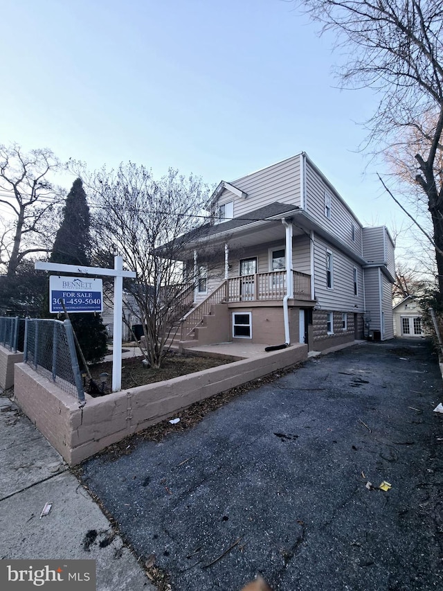 view of home's exterior with covered porch